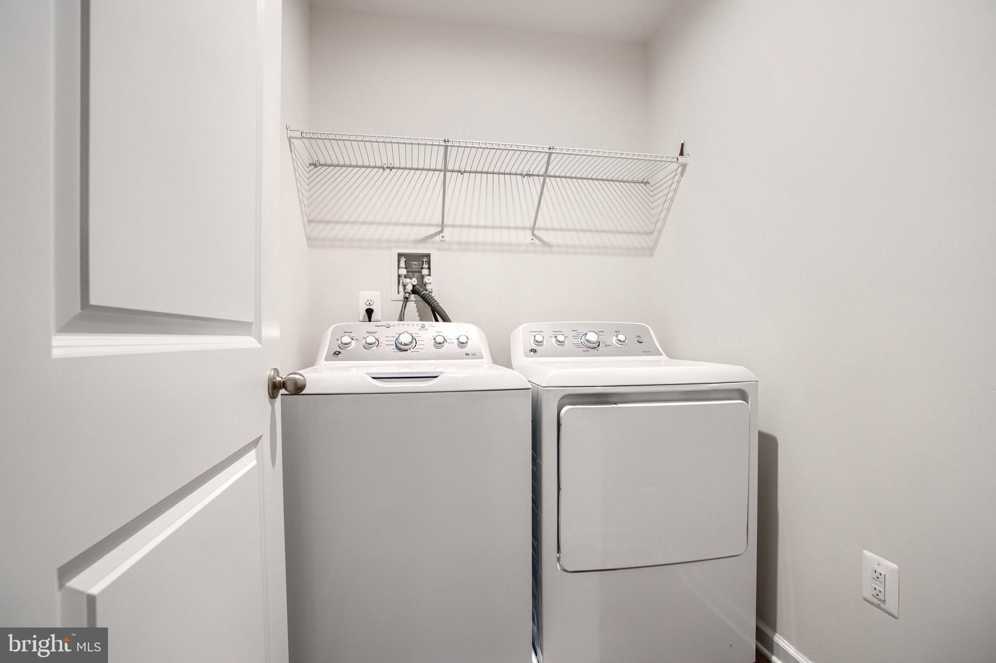 104 Magnolia Drive Elkton, MD 21921 - Photo 35 of 52 a utility room with dryer and washer