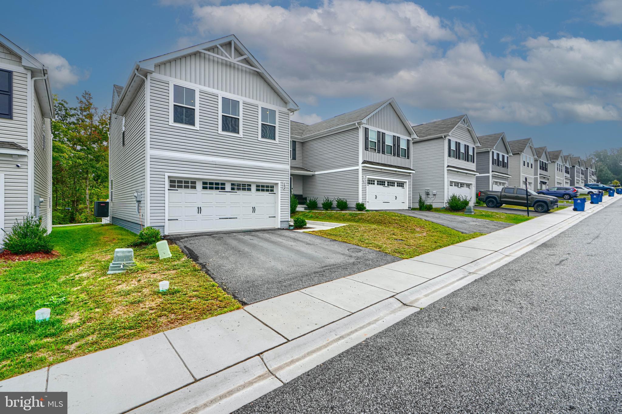 104 Magnolia Drive Elkton, MD 21921 - Photo 4 of 52 a front view of a house with garden