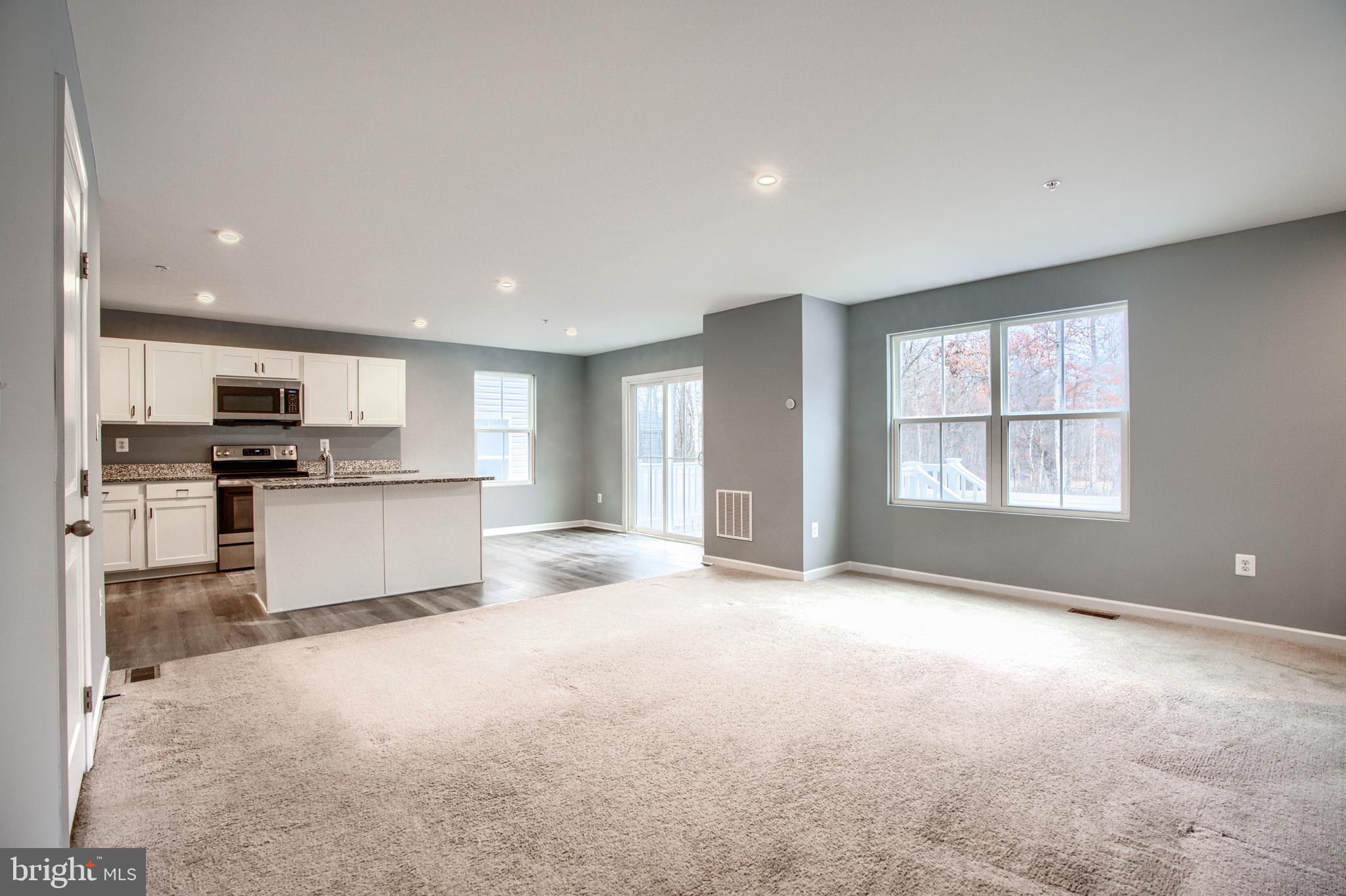 104 Magnolia Drive Elkton, MD 21921 - Photo 5 of 52 a view of kitchen with refrigerator and window
