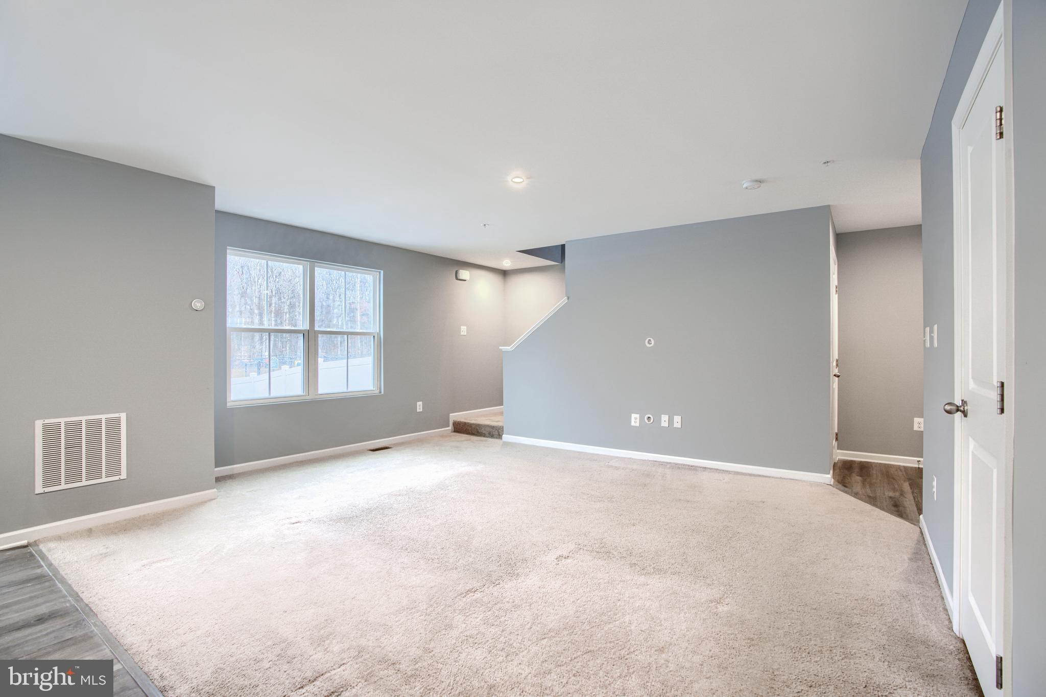 104 Magnolia Drive Elkton, MD 21921 - Photo 8 of 52 an empty room with windows and closet