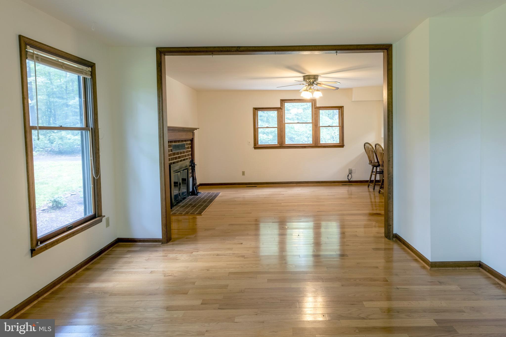 8135 Moormont Road Rapidan, VA 22733 - Photo 6 of 61 Looking from the living room into the dining area