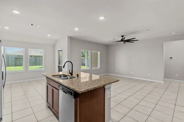 a view of kitchen island with furniture and wooden floor