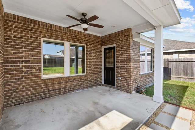 a front view of a house with a large window