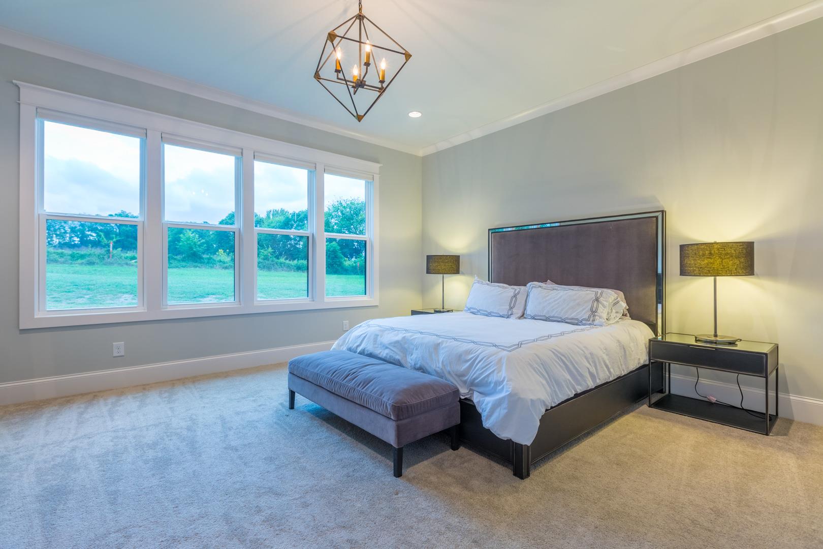 4119 Old Light Circle Arrington, TN 37014 - Photo 12 of 25 a spacious bedroom with a bed and a large window