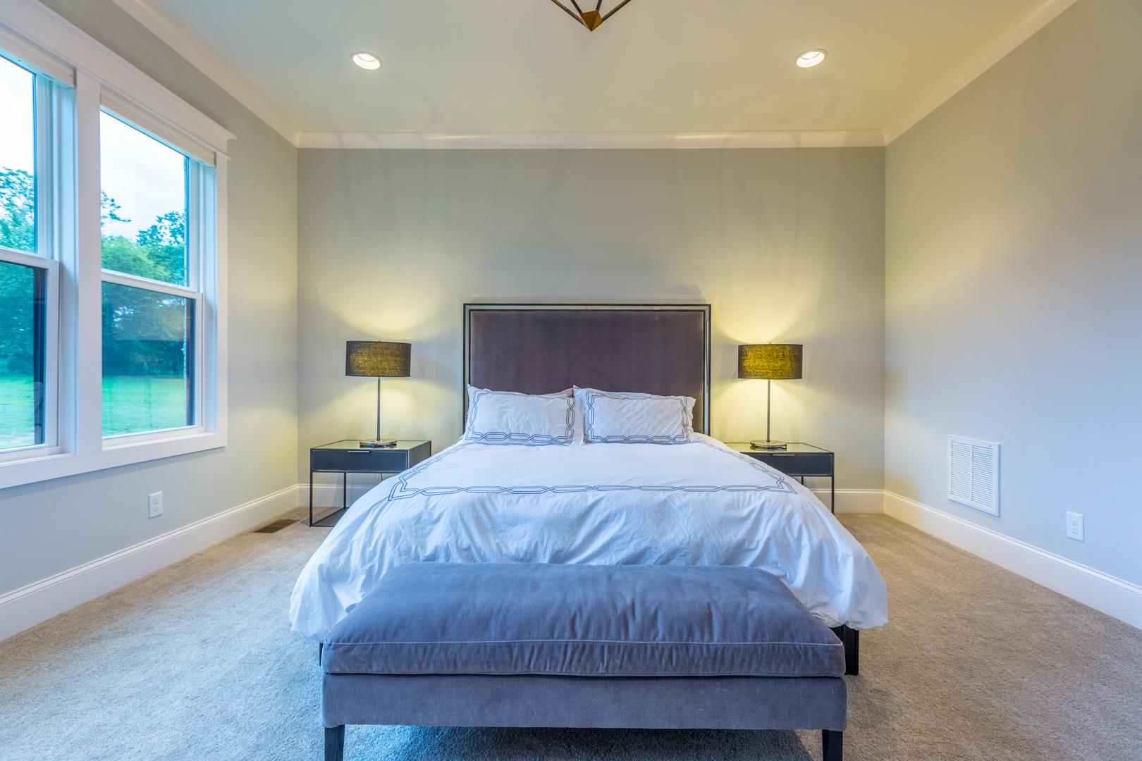 4119 Old Light Circle Arrington, TN 37014 - Photo 13 of 25 a bedroom with a bed and wooden floor