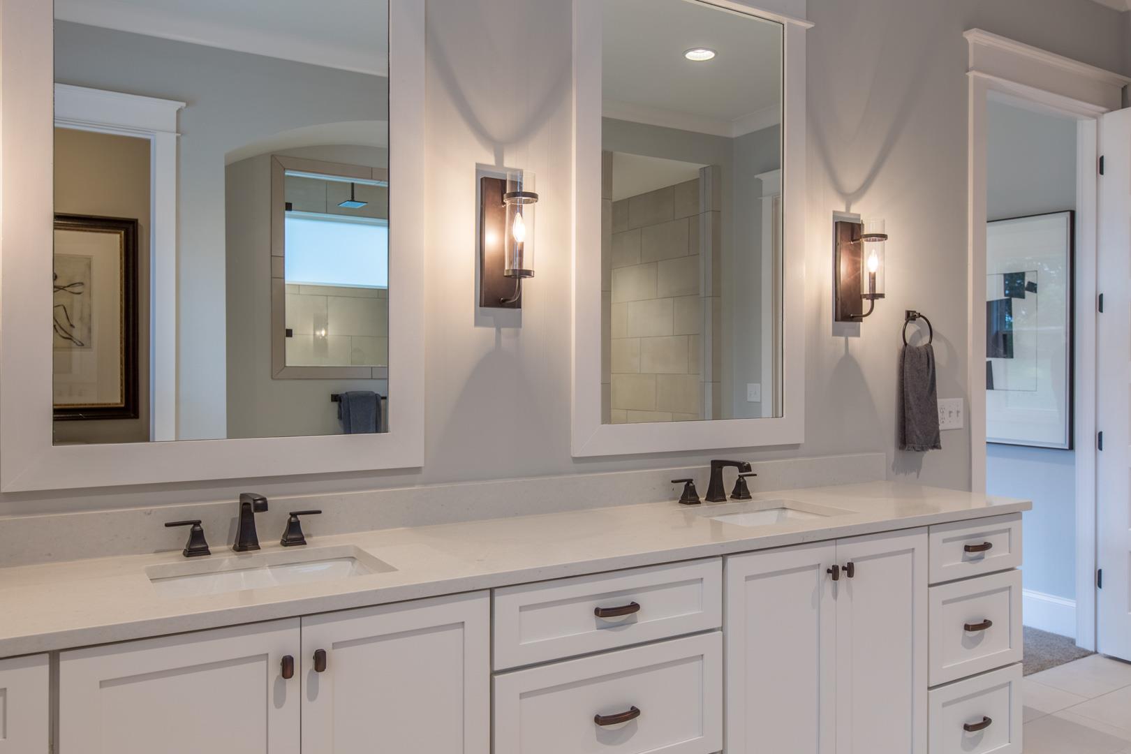 4119 Old Light Circle Arrington, TN 37014 - Photo 15 of 25 a bathroom with double sink and a mirror