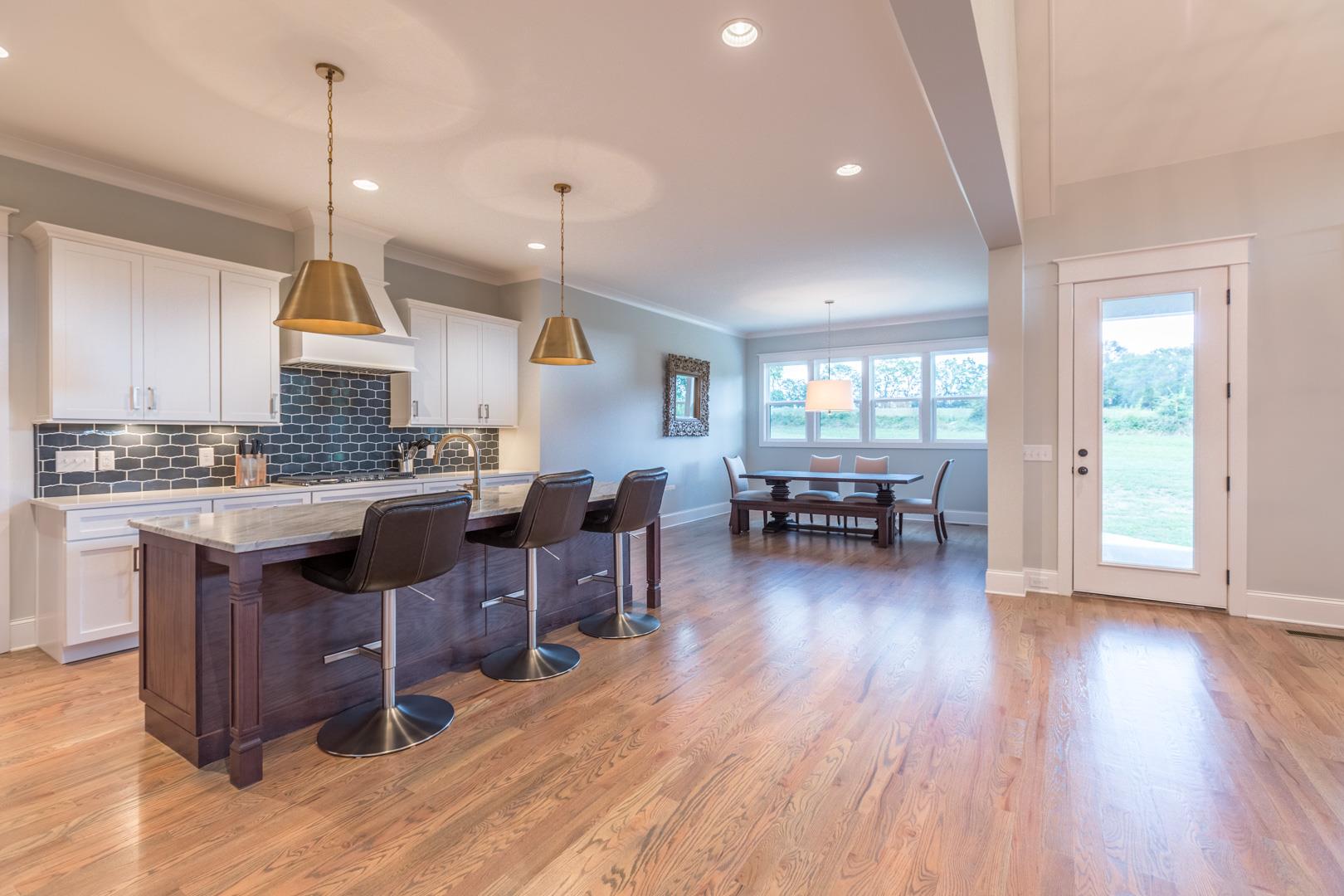 4119 Old Light Circle Arrington, TN 37014 - Photo 7 of 25 a living room with furniture window wooden floor and kitchen view