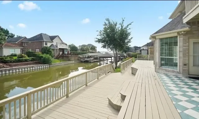 a view of a lake with a deck