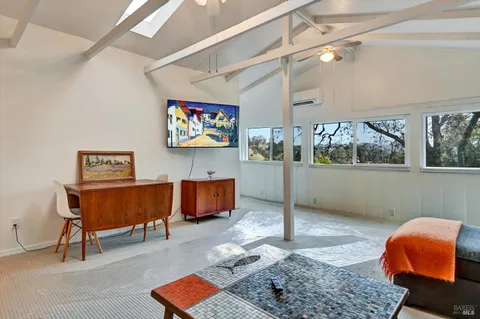 a workspace with furniture and window