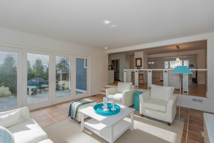 63 Roton Avenue Rowayton, CT 06853 - Photo 13 of 30 a living room with furniture and a large window