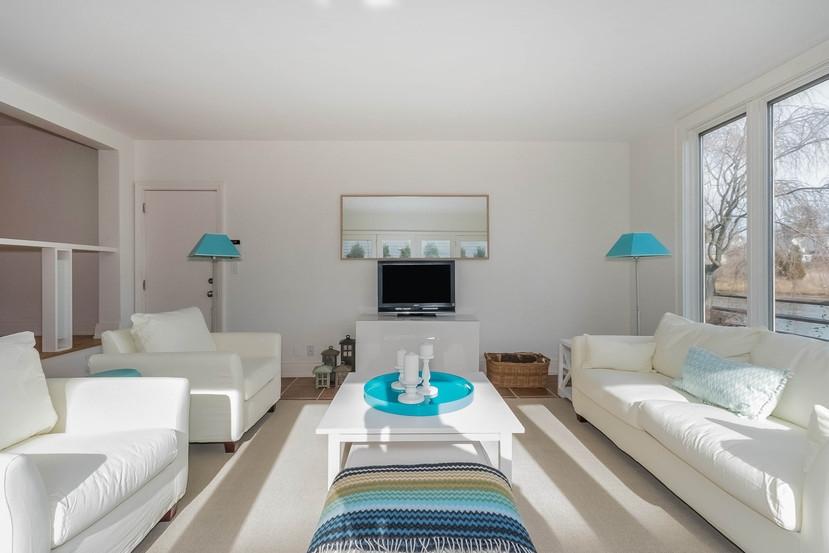 63 Roton Avenue Rowayton, CT 06853 - Photo 14 of 30 a living room with furniture and a fireplace