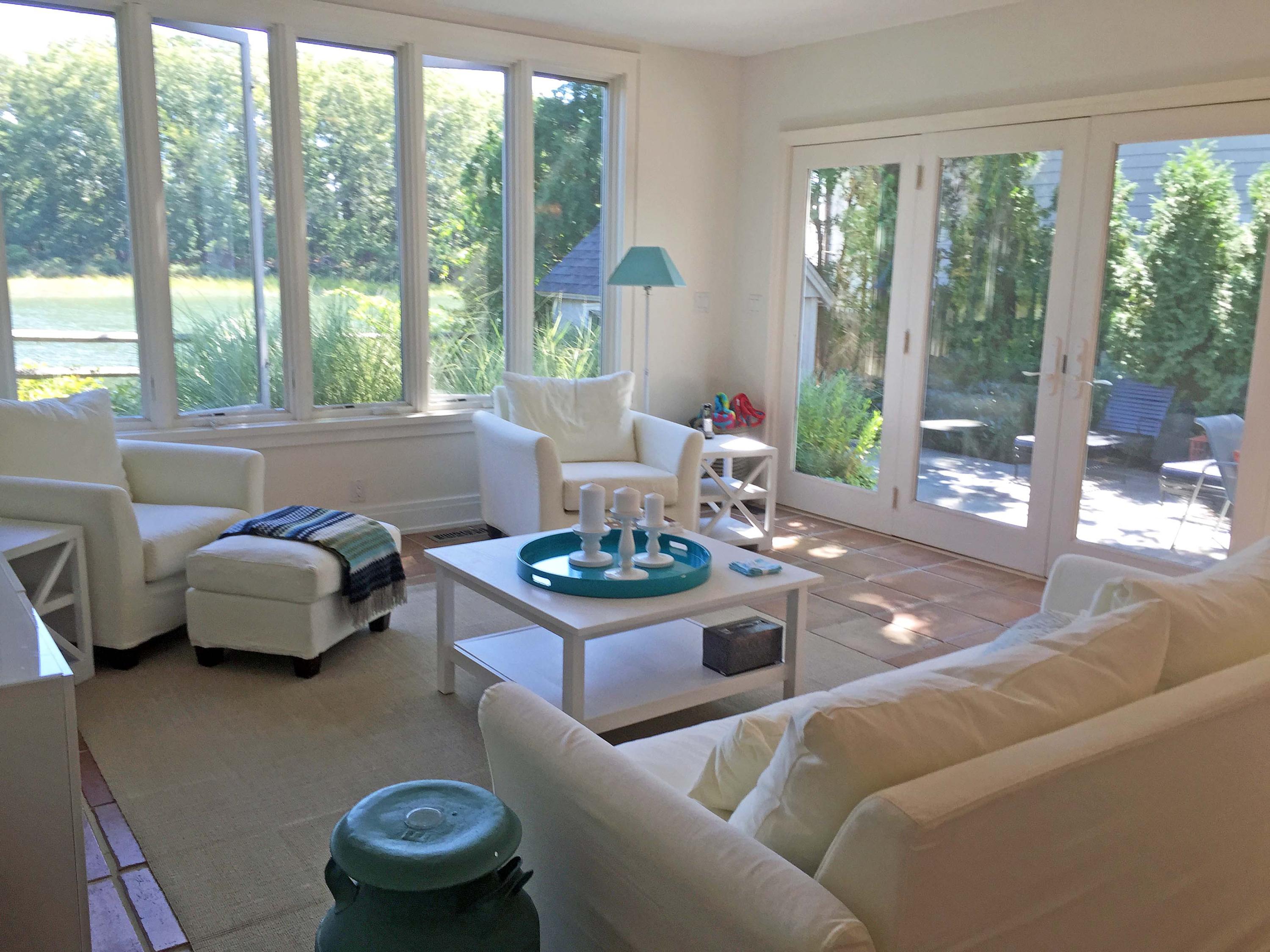63 Roton Avenue Rowayton, CT 06853 - Photo 4 of 30 a living room with furniture and a large window