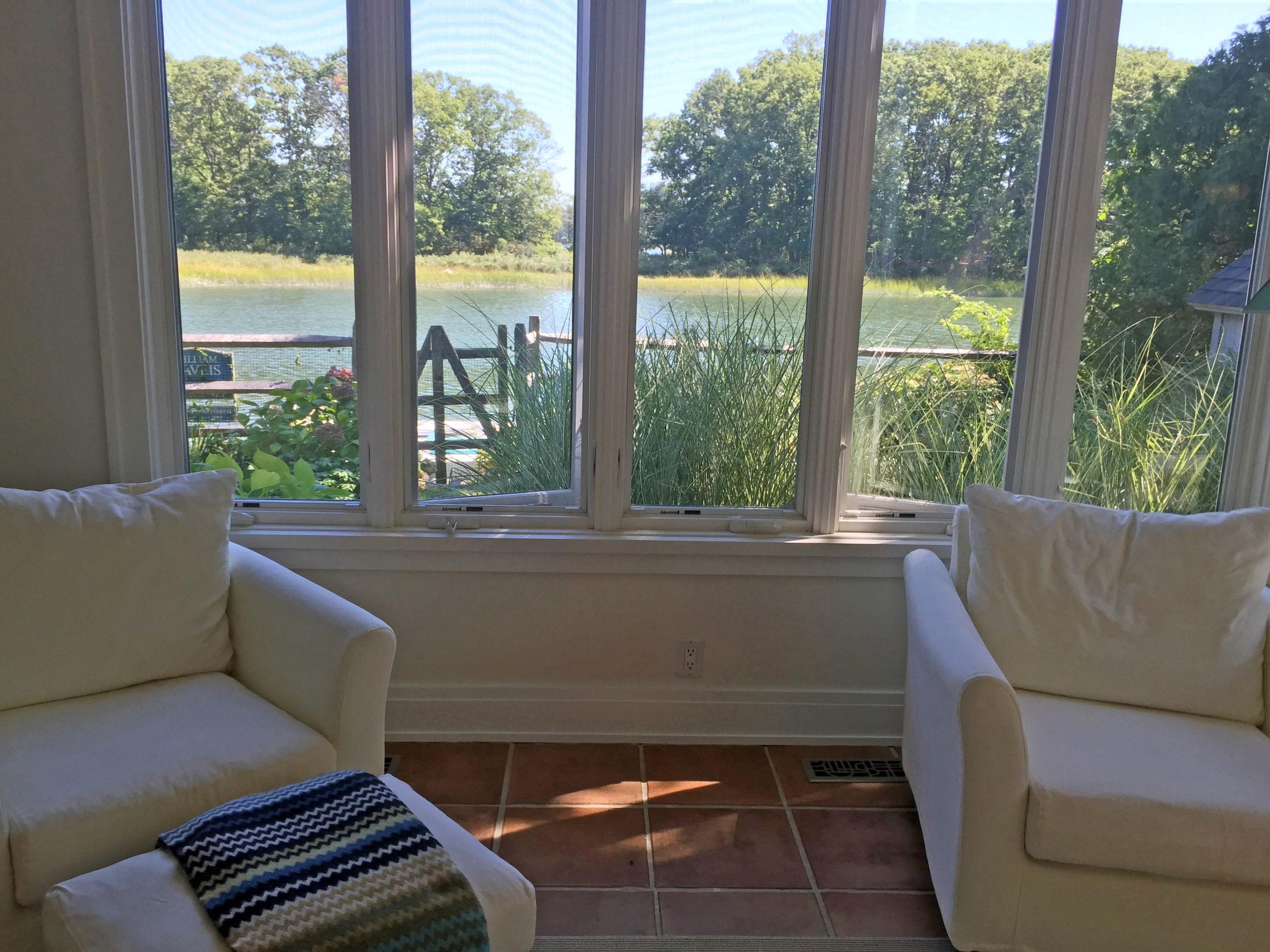 63 Roton Avenue Rowayton, CT 06853 - Photo 5 of 30 a living room with a couch and a window