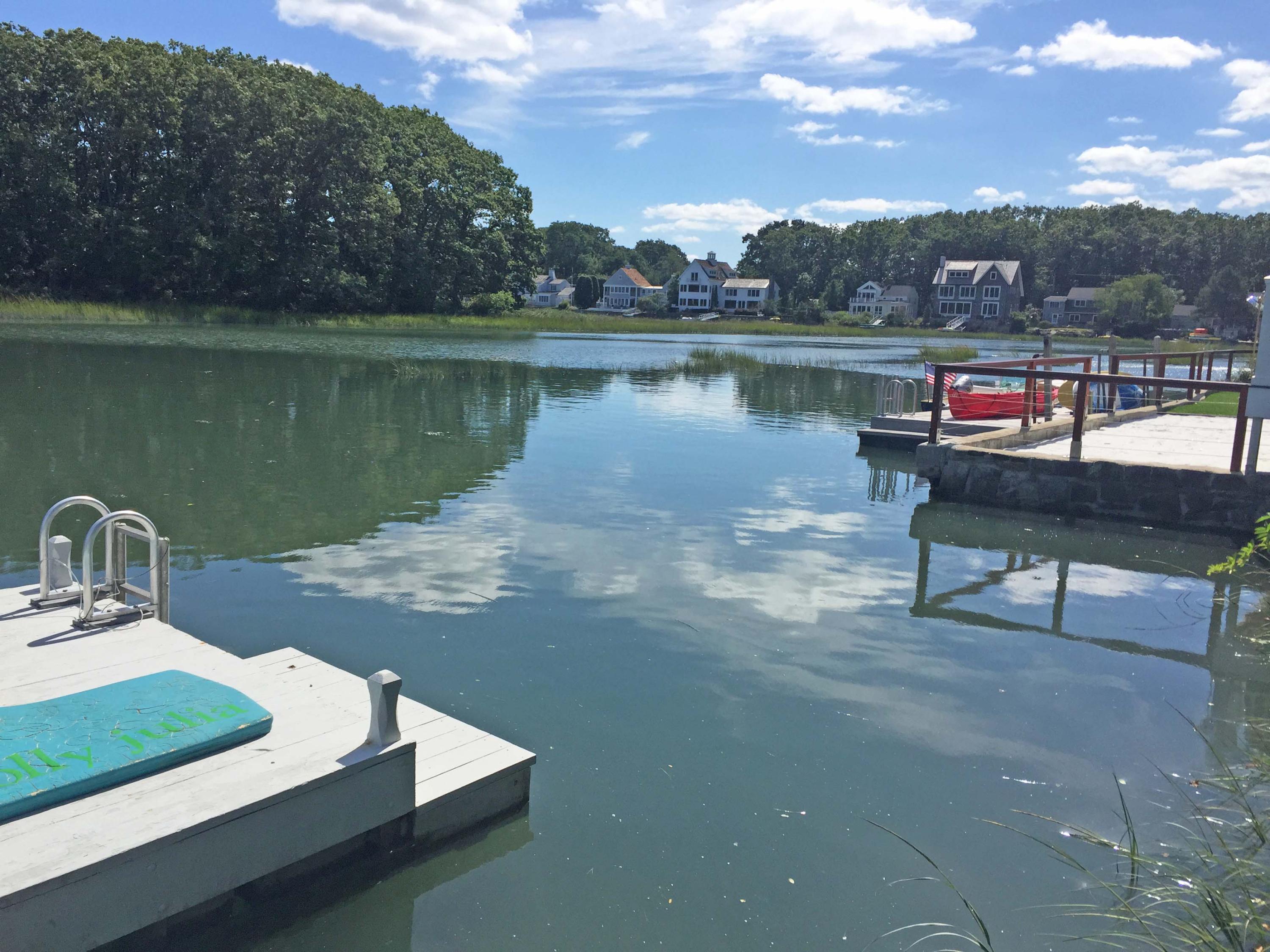 63 Roton Avenue Rowayton, CT 06853 - Photo 6 of 30 a view of a lake with sitting area