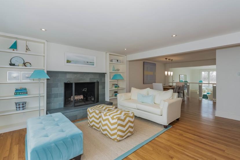 63 Roton Avenue Rowayton, CT 06853 - Photo 9 of 30 a living room with furniture and a fireplace