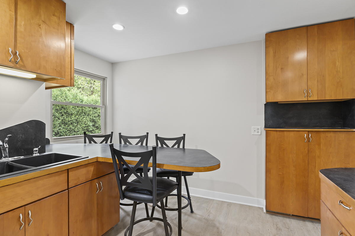 2900 Swallow Lane Rolling Meadows, IL 60008 - Photo 12 of 37 a view of a dining room with furniture and window