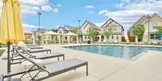 8513 Shorehan Road The Colony, TX 75056 - Photo 23 of 25 Community pool with a patio and a residential view