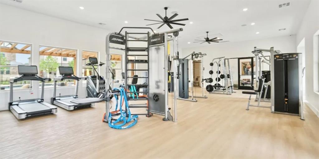 8513 Shorehan Road The Colony, TX 75056 - Photo 24 of 25 Gym featuring wood finished floors, ceiling fan, and recessed lighting