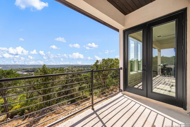 a view of a backyard of the house