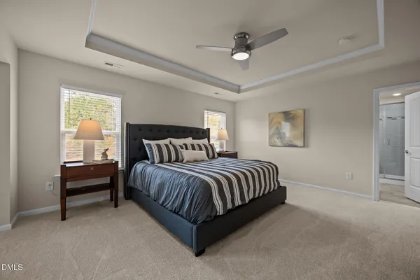 a bedroom with a bed and closet