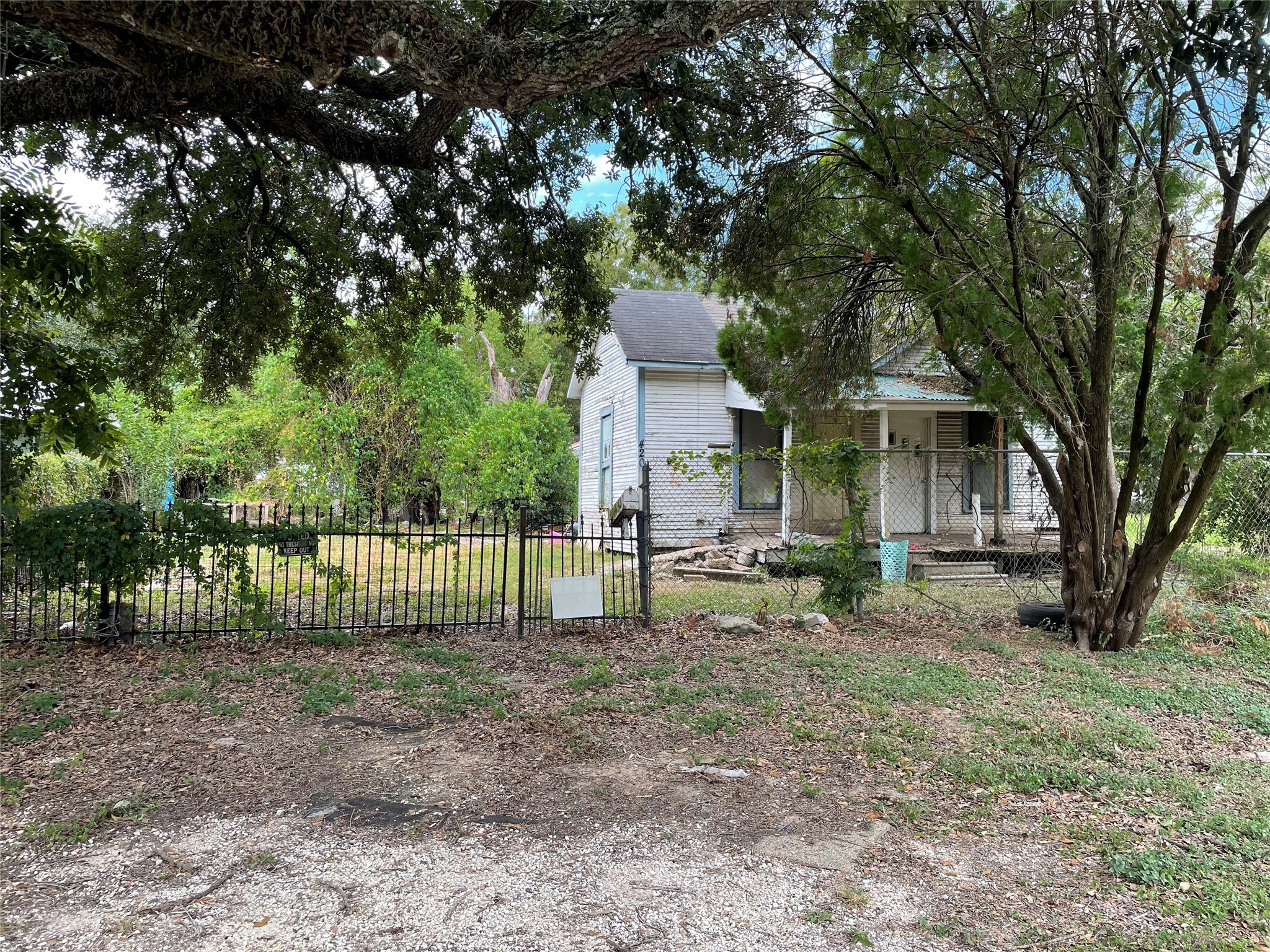 420 4th Street Rosenberg, TX 77471 - Photo 1 of 16 a view of a house with a yard and sitting area