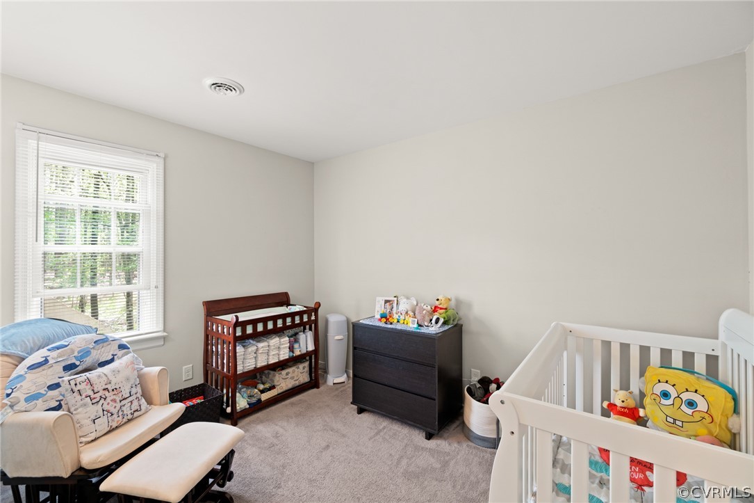 3551 Markey Road Midlothian, VA 23112 - Photo 15 of 24 a bedroom with a bed and a window