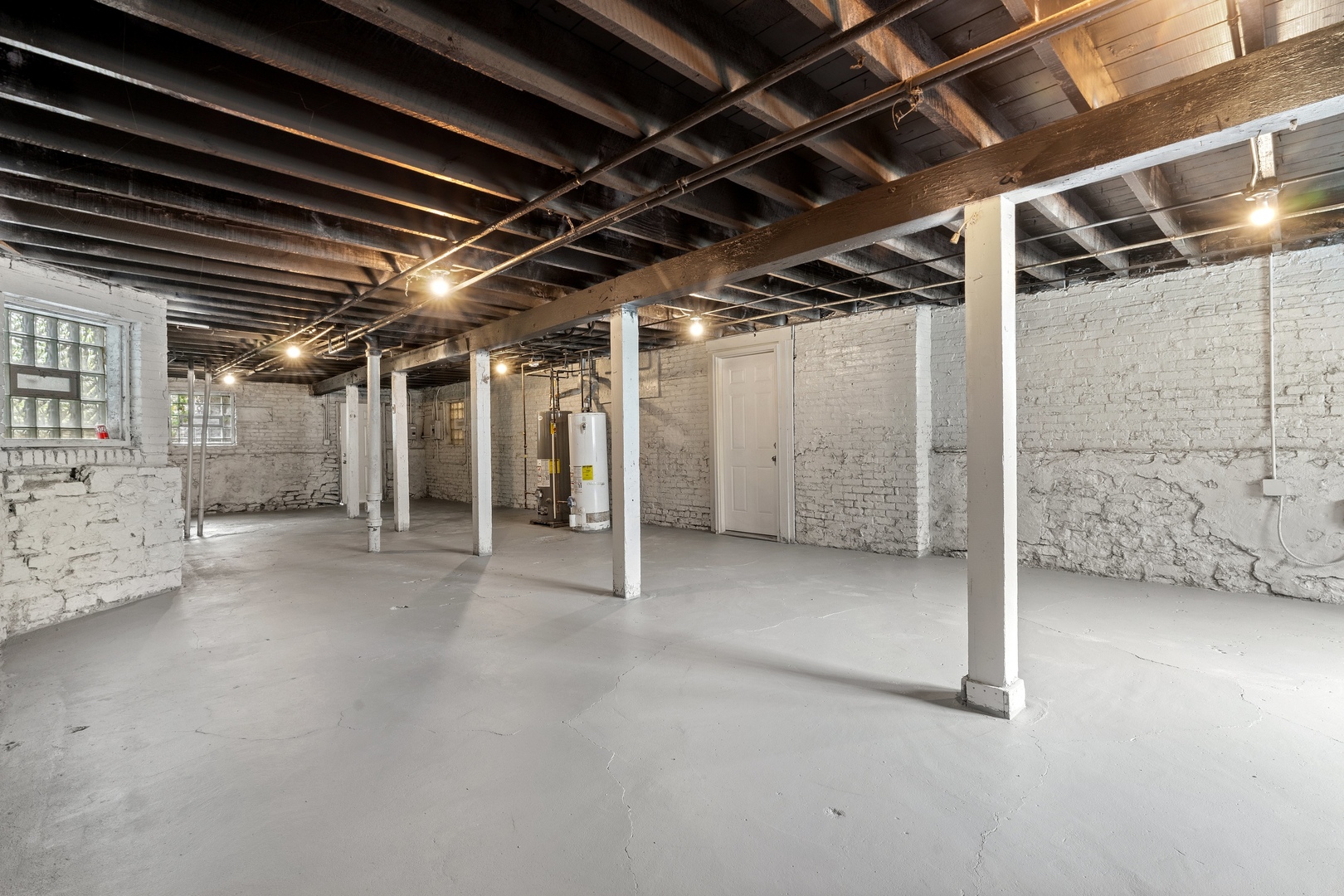 4718 West Monroe Street Chicago, IL 60644 - Photo 12 of 13 a view of empty room with wooden ceiling