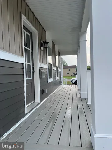 a view of balcony and kitchen