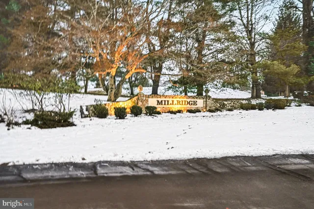 a view of a yard covered in snow