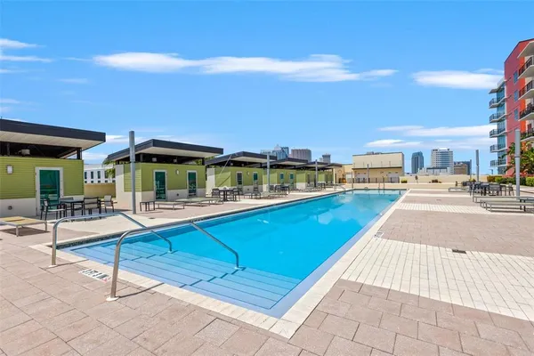 a view of a backyard with sitting area