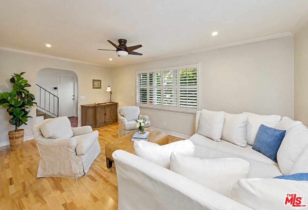 697 Washington Boulevard Marina del Rey, CA 90292 - Photo 2 of 23 a living room with furniture and a large window
