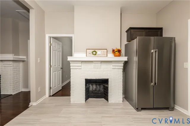 a view of a livingroom with a fireplace