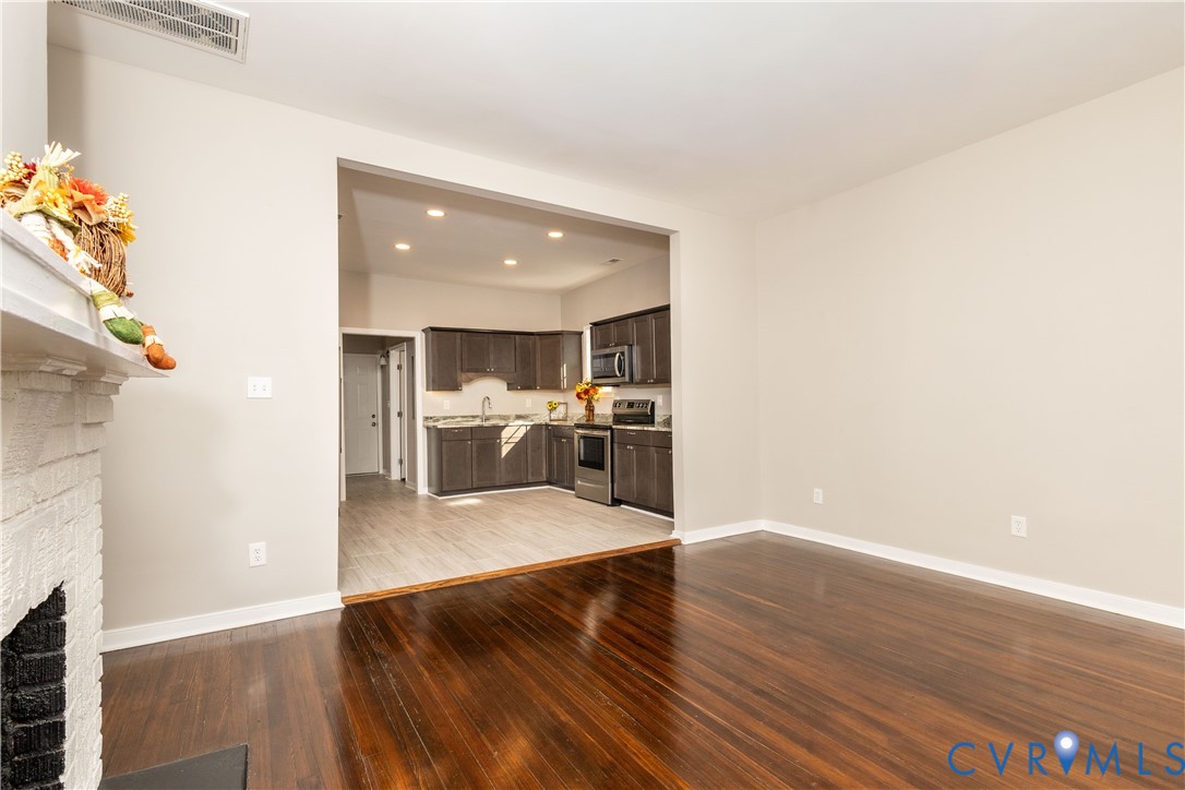 6103 Hermitage Road Henrico, VA 23228 - Photo 9 of 44 a view of a living room with kitchen furniture and a kitchen view