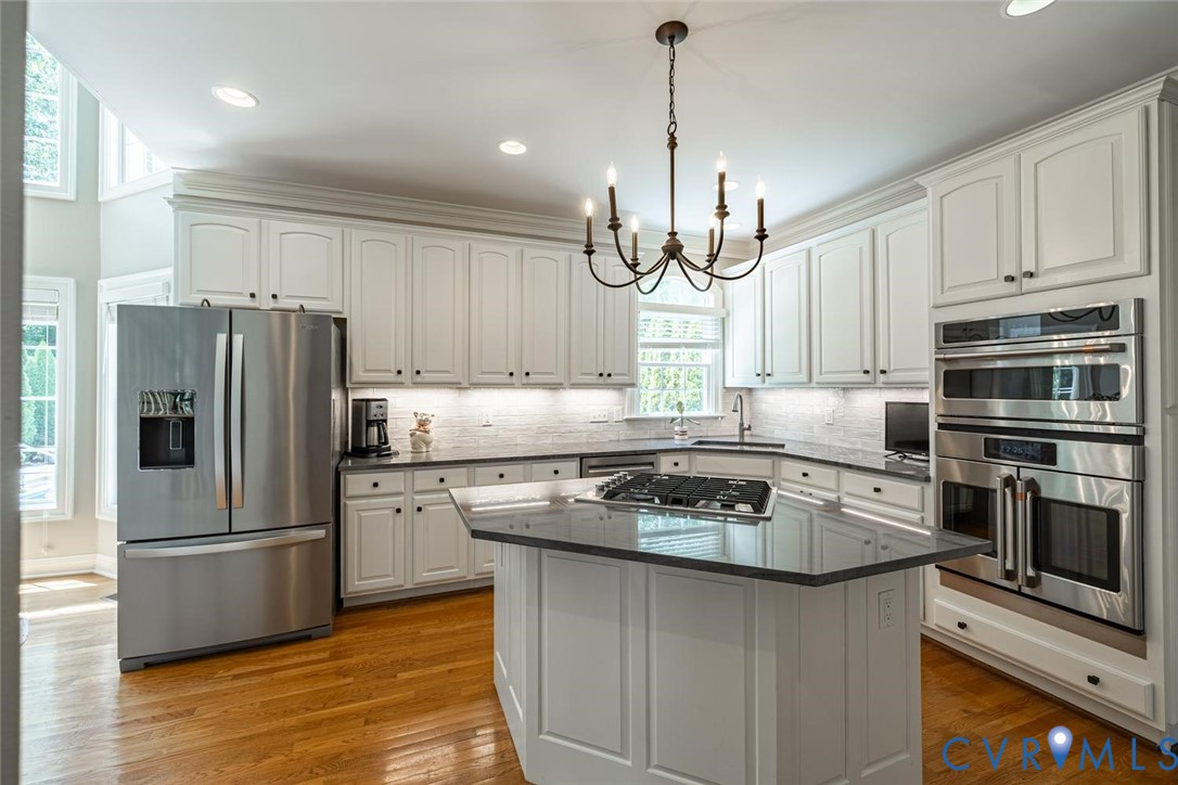14469 Riverside Drive Ashland, VA 23005 - Photo 12 of 59 Quartzite counters, tile backsplash, island, gas c