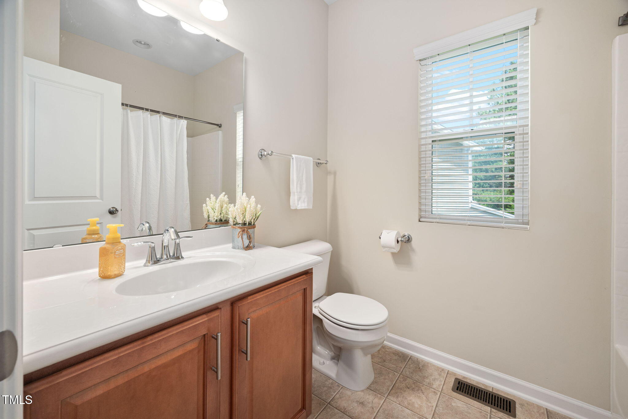 809 Davidson Point Road Cary, NC 27513 - Photo 33 of 62 2nd Floor Hall Bath With Cabinet Vanity