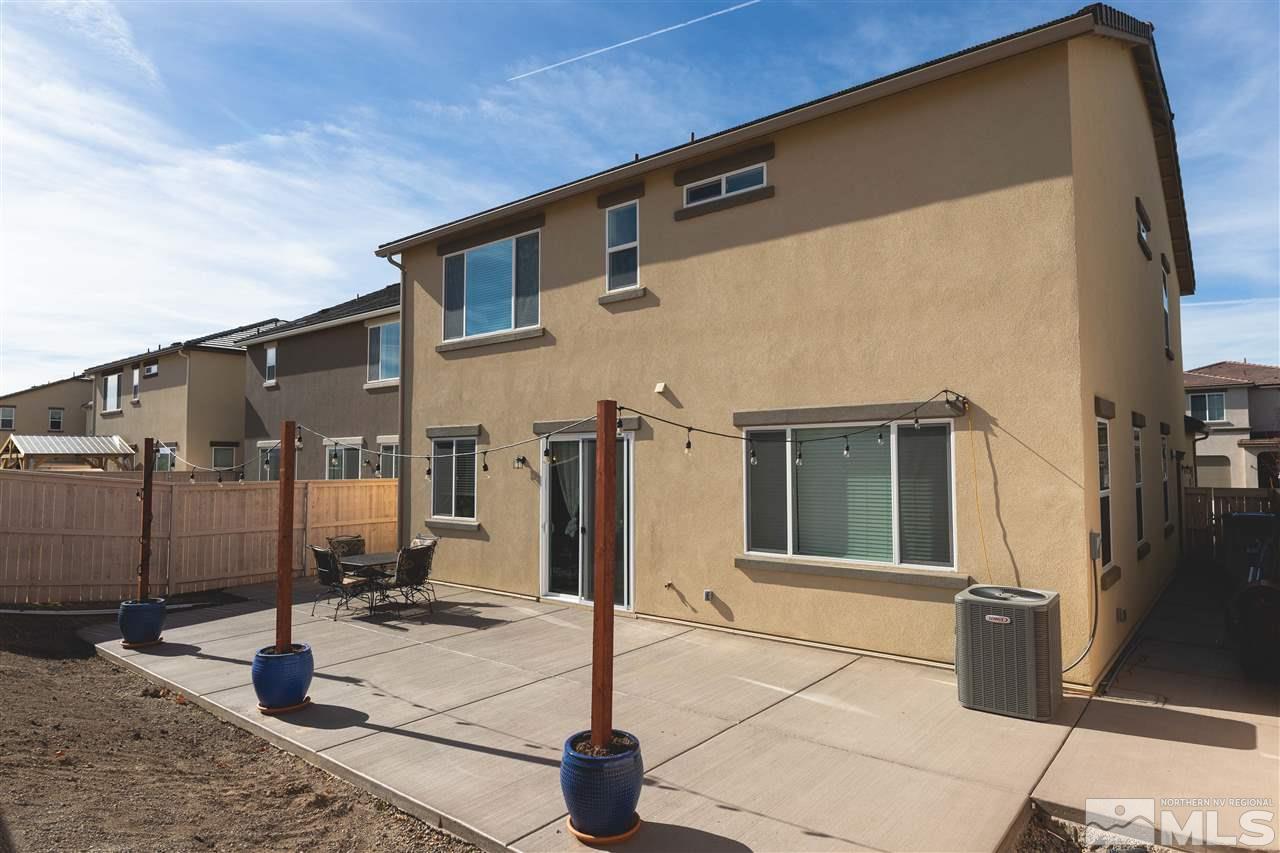 9746 Pachuca Drive Reno, NV 89521 - Photo 24 of 25 a view of a house with patio