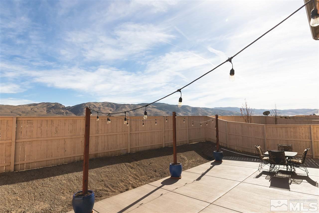 9746 Pachuca Drive Reno, NV 89521 - Photo 25 of 25 a view of a terrace with a bench