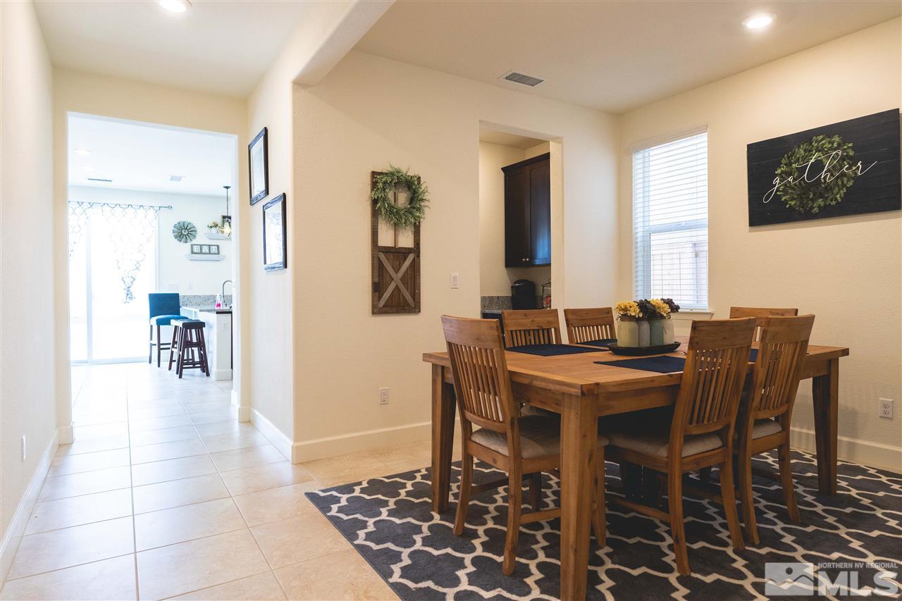9746 Pachuca Drive Reno, NV 89521 - Photo 8 of 25 a view of a dining room with furniture