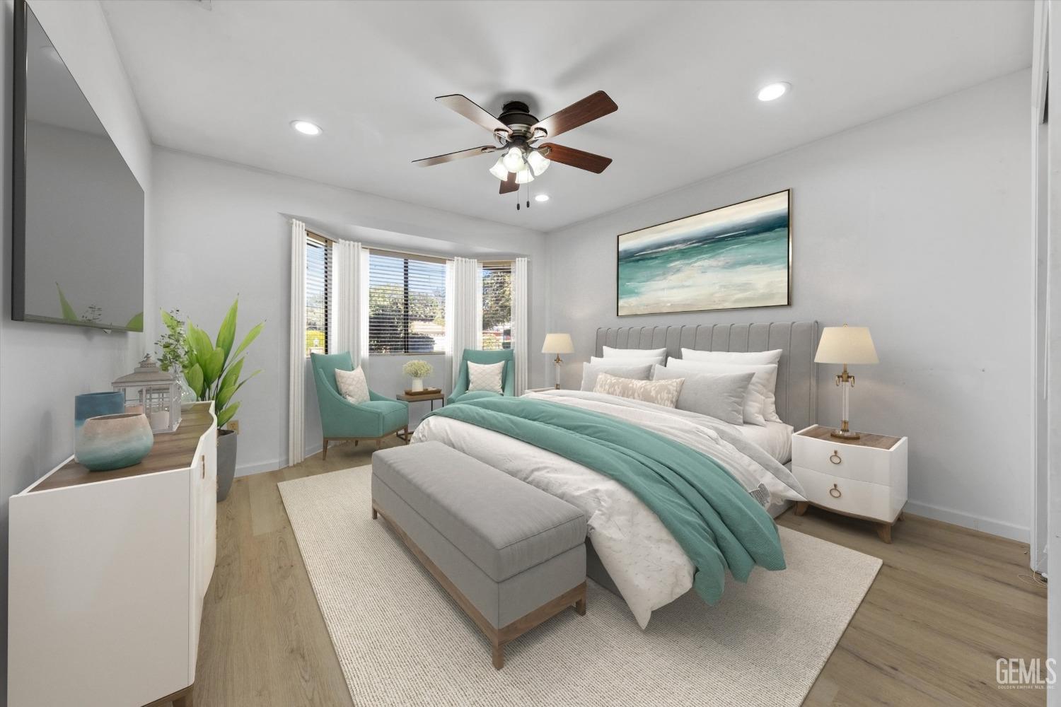 Undisclosed Address Bakersfield, CA 93312 - Photo 19 of 49 a bedroom with bed and a potted plant