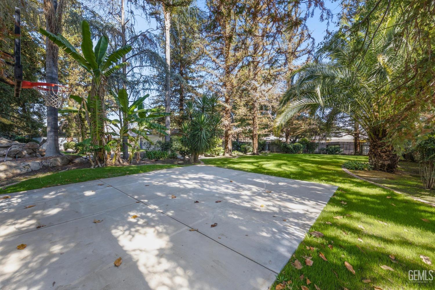 Undisclosed Address Bakersfield, CA 93312 - Photo 36 of 49 a view of a park with a tree