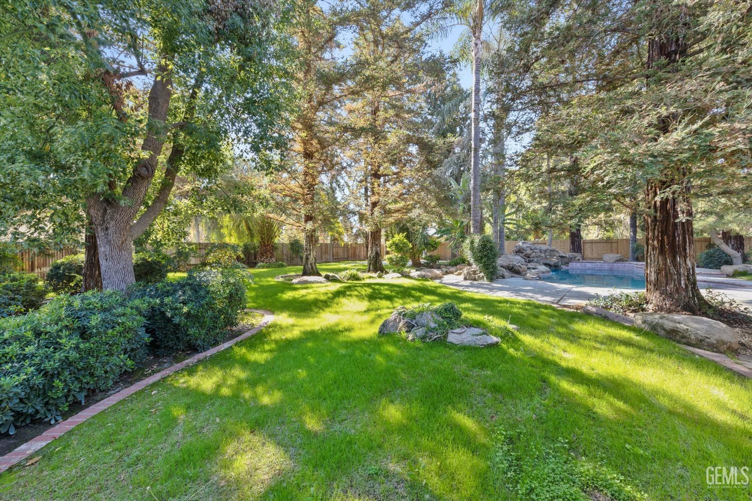 Undisclosed Address Bakersfield, CA 93312 - Photo 37 of 49 a view of yard with green space