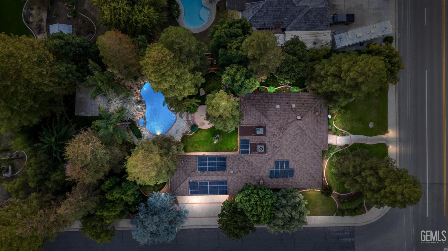 Undisclosed Address Bakersfield, CA 93312 - Photo 45 of 49 an aerial view of a house with a yard