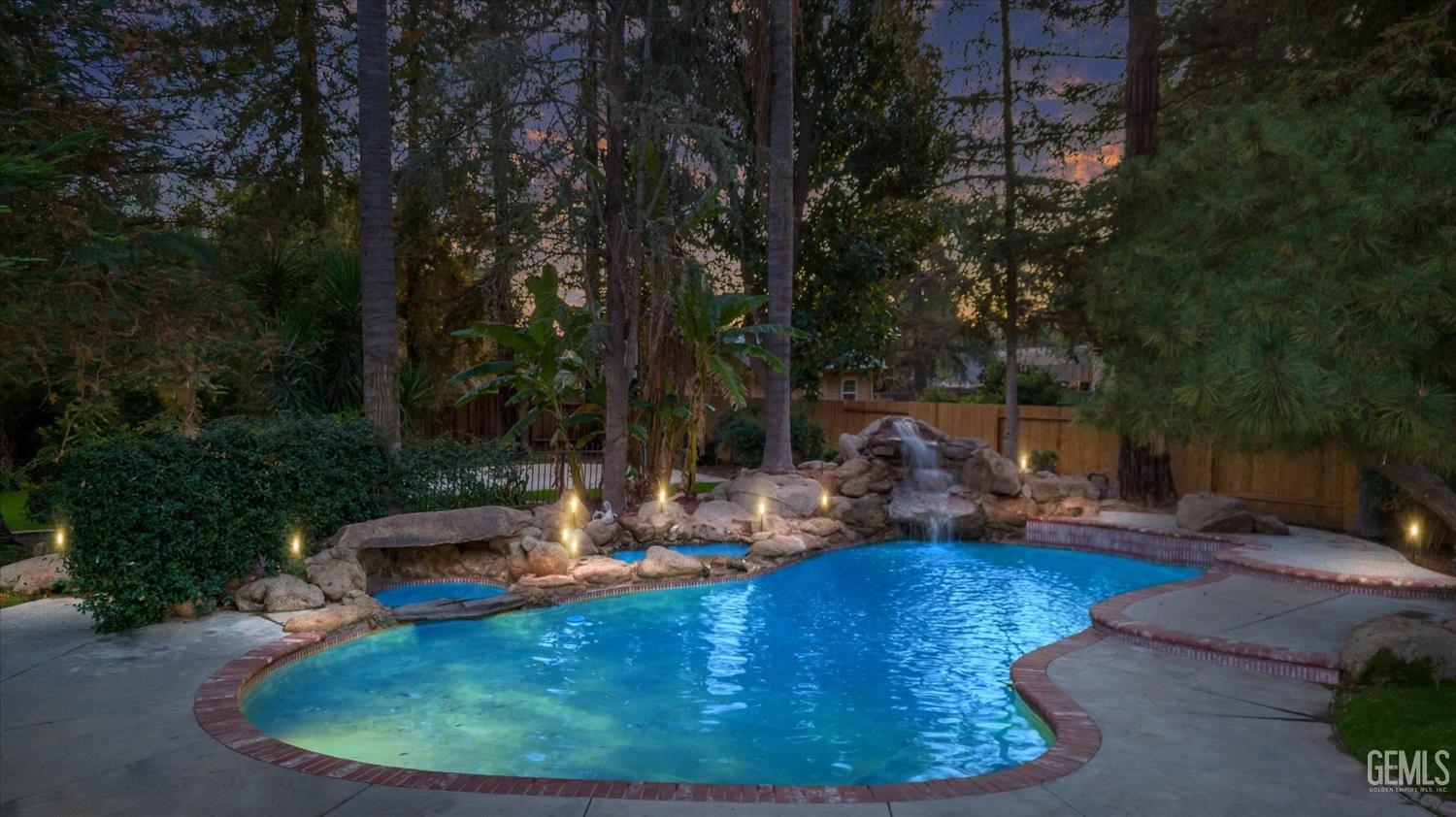 Undisclosed Address Bakersfield, CA 93312 - Photo 46 of 49 a view of a swimming pool with a sitting area