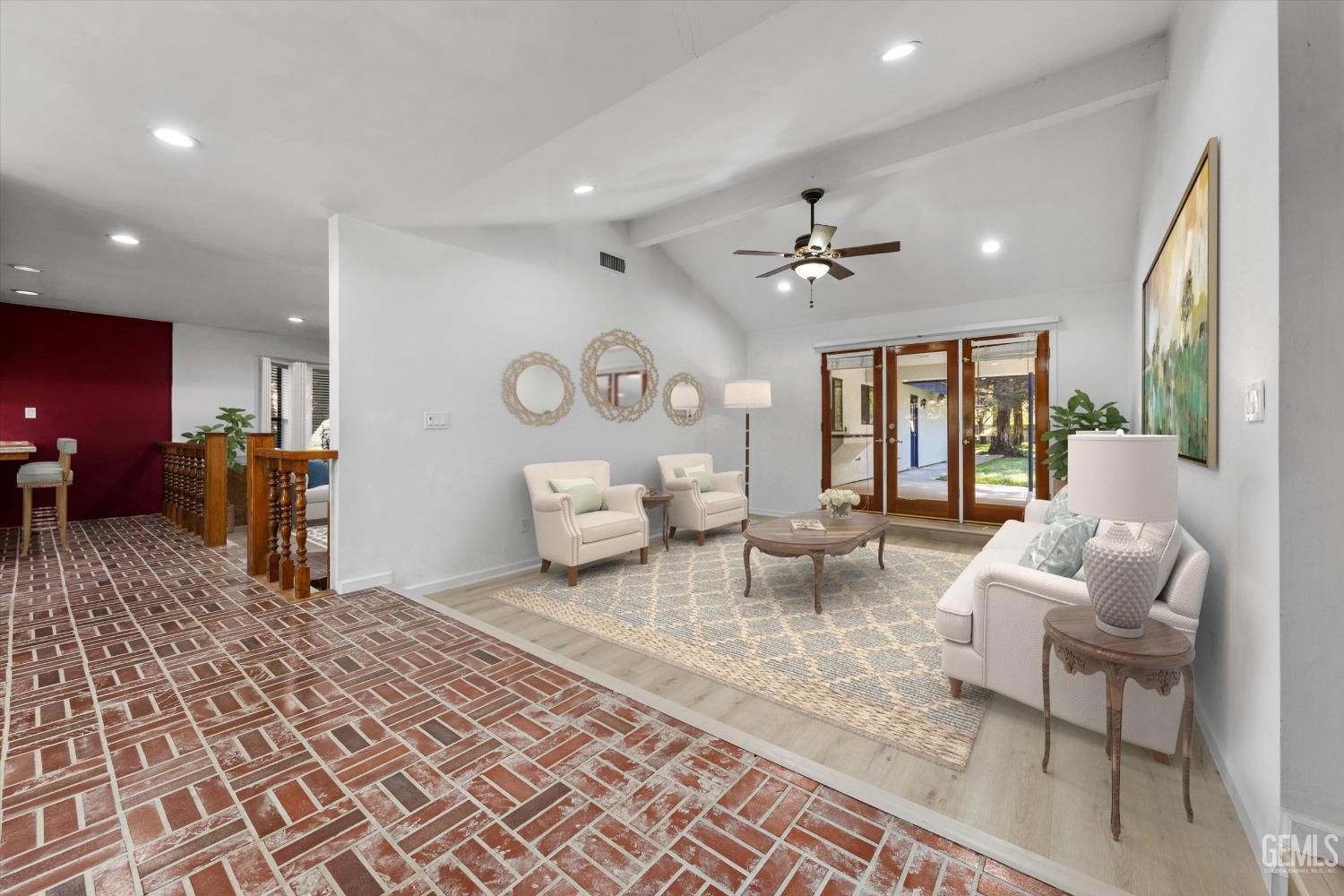 Undisclosed Address Bakersfield, CA 93312 - Photo 6 of 49 a living room with furniture and a chandelier