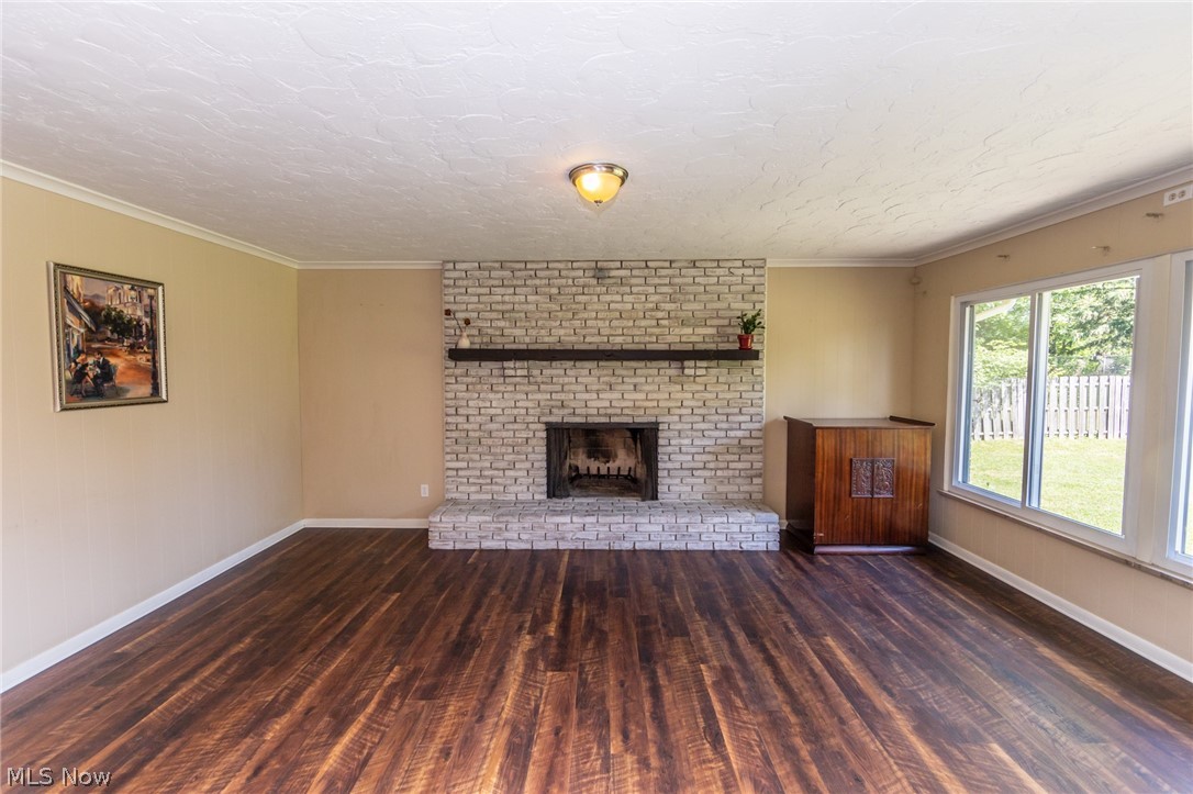 13145 East Bagley Road Cleveland, OH 44130 - Photo 9 of 35 Hearth room is spacious and anchors the open concept kitchen and dining layout!