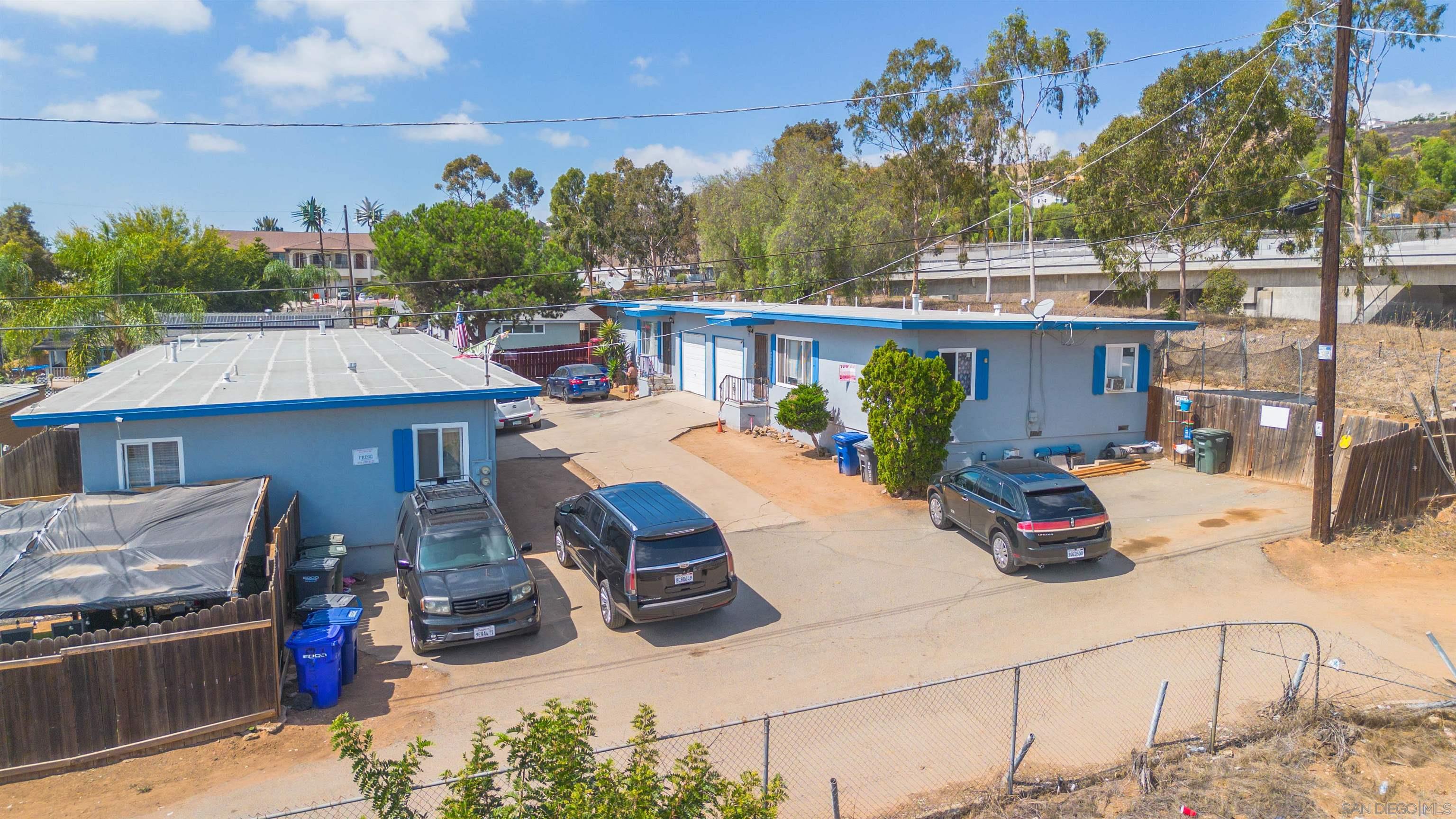 8050 Lemon Grove Way Lemon Grove, CA 91945 - Photo 11 of 19 a view of a terrace with furniture and a fire pit