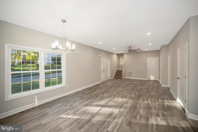 a kitchen with a refrigerator stove and microwave