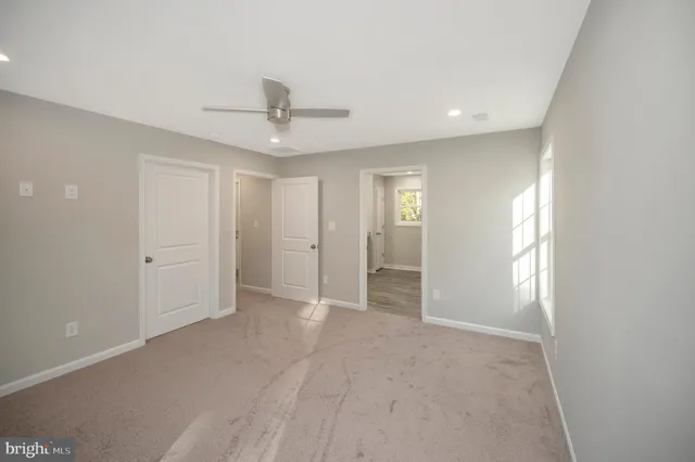 an empty room with windows