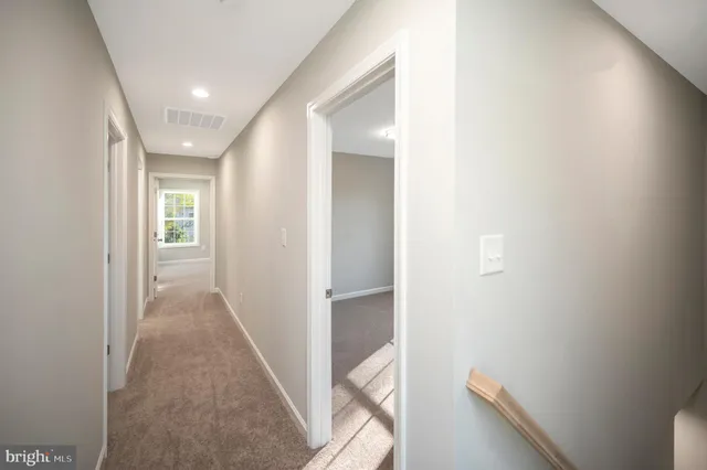 a front view of a building with garden