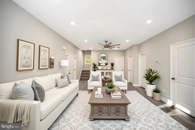 a spacious bedroom with a bed and a window